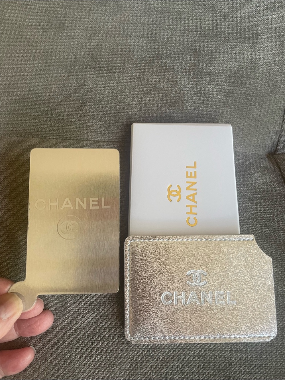 CHANEL Metallic Silver Card Sleeve with CC Charm